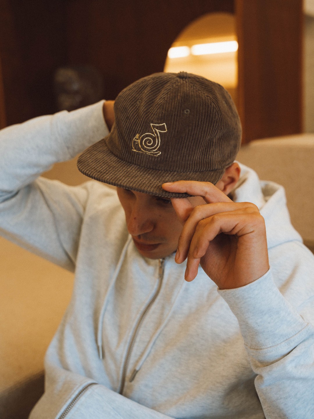 Embroidered cord cap designed for renowned designer Steve Gavan.