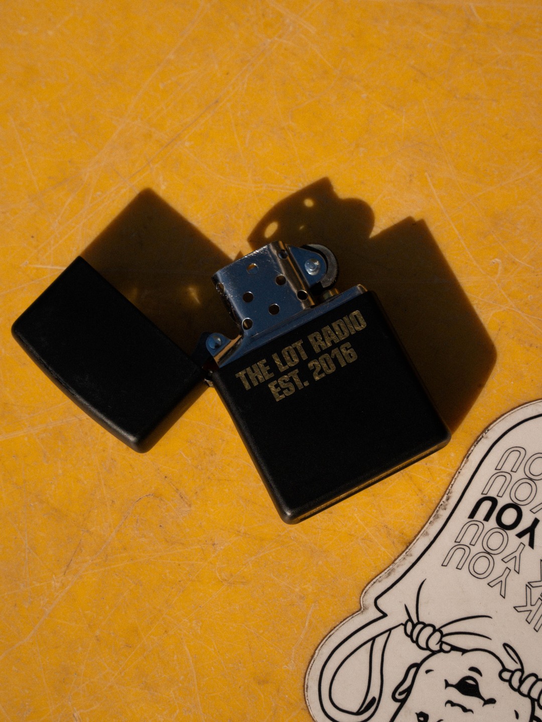 Custom Zippo lighters for The Lot Radio New York.